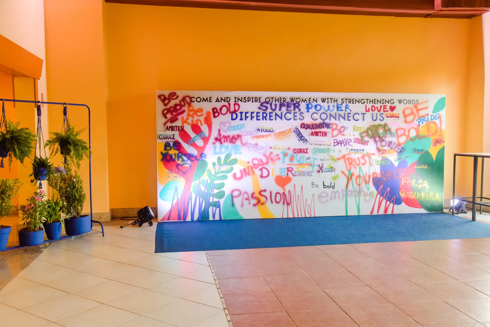 Graffiti wall painted over the key visual's shapes